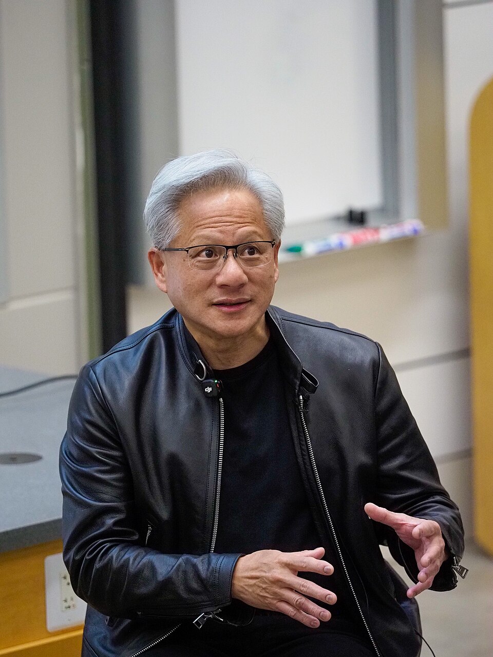 Jensen Huang speaking and gesturing at Stanford University in April 2026.