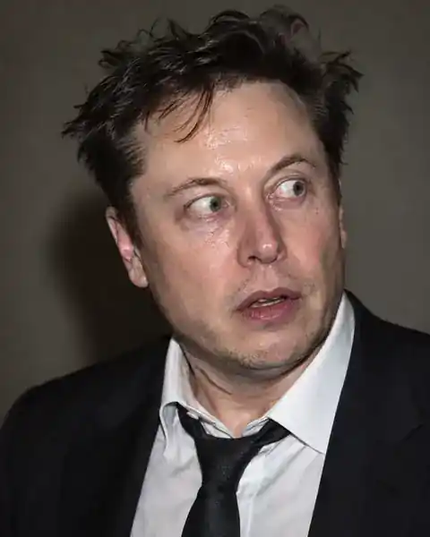 Generated editorial portrait of Elon Musk looking startled and disheveled.